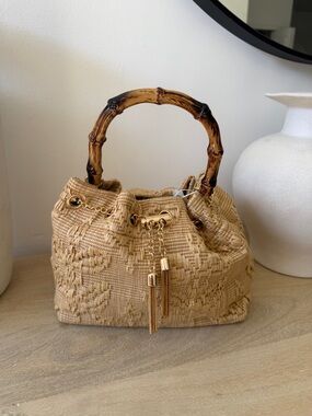 Tommy Bahama Woven Straw Mini Bag with Bamboo Handles and Gold Tassel